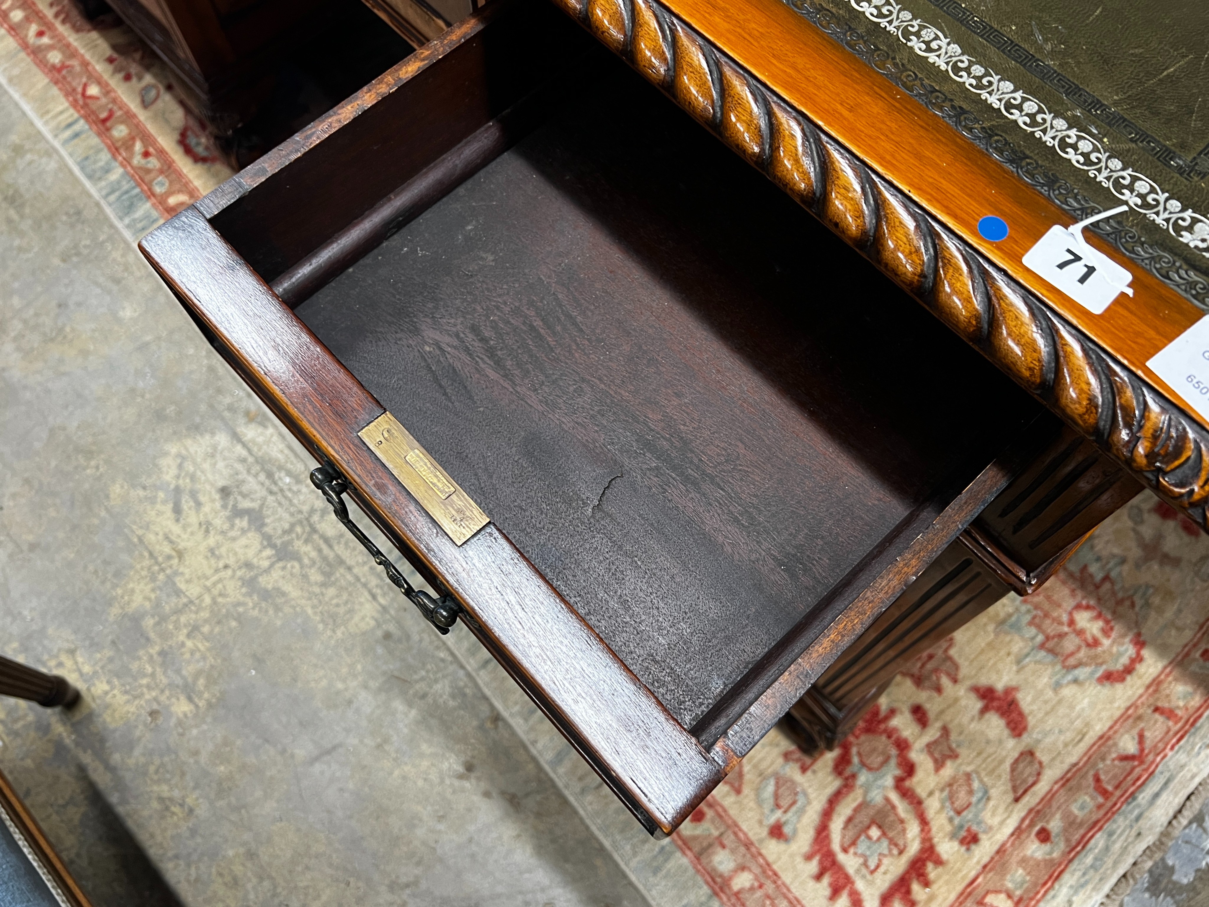 An early 20th century George III style mahogany pedestal desk, length 152cm, depth 91cm, height 81cm